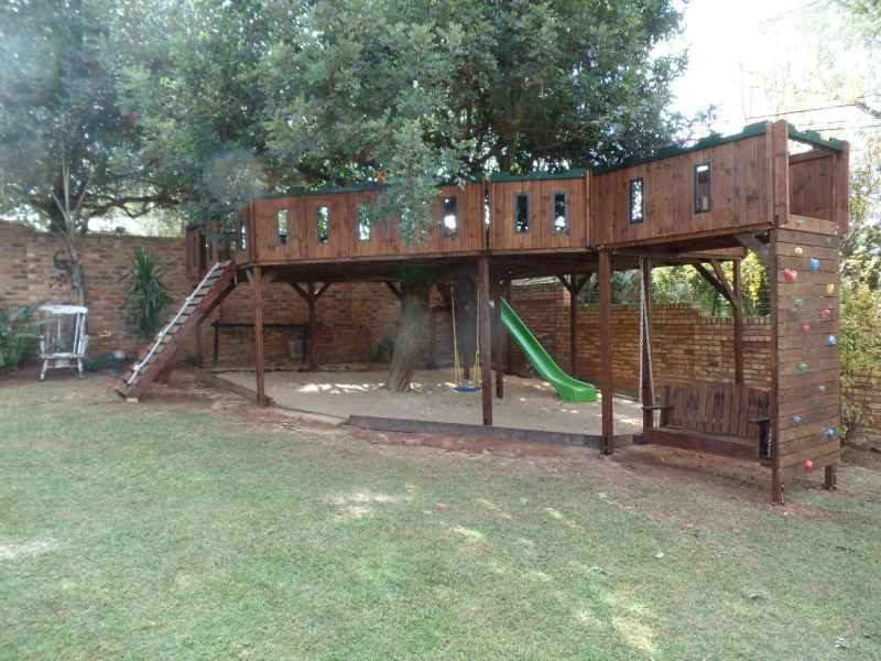13 - Big Wooden Platforms with Swing Bench underneath, cut-outs at the railings, and single toddler swing underneath platform.